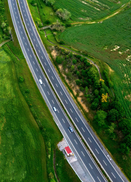 Aerial view of highway in the country Aerial view of highway in the country filming point of view highway day road stock pictures, royalty-free photos & images