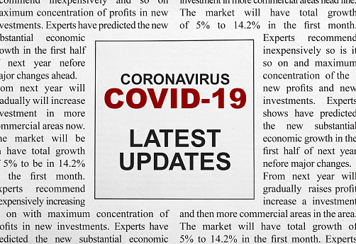 Covid-19 headline on newspaper, white background