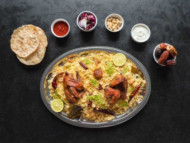 istock Arabic traditional food bowls Kabsa with meat 1214327218