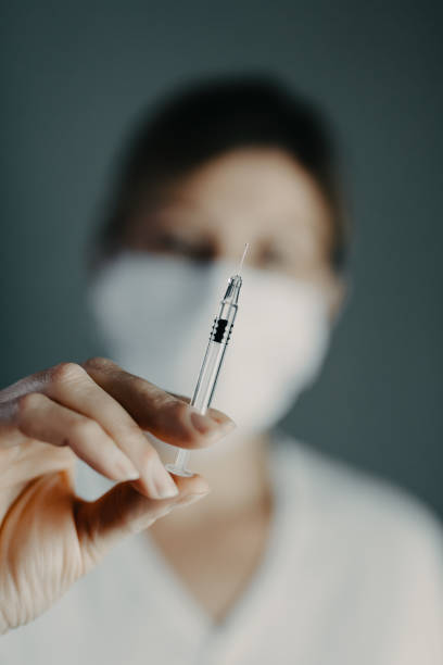 istock Doctor wearing protection face mask 1214328200