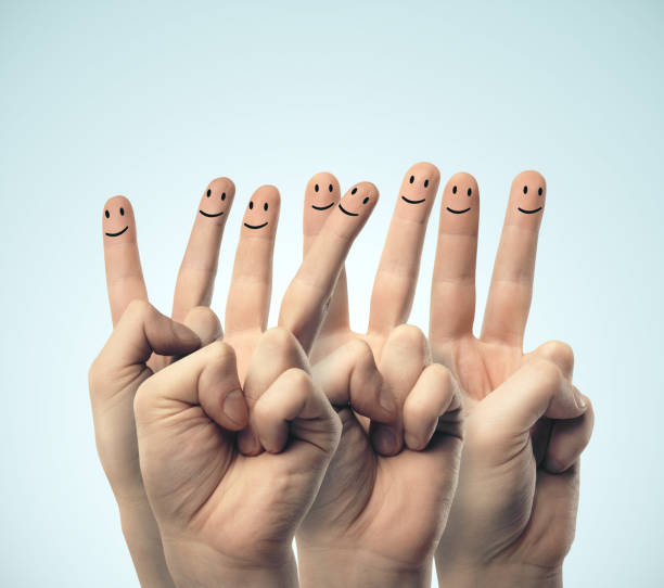 istock Group of finger smileys 1214328514