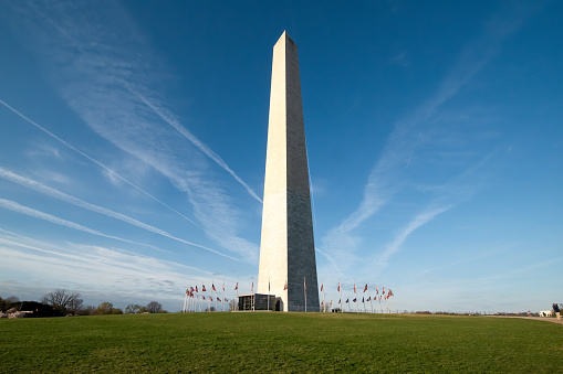 View of the Washington Monument with flags at base