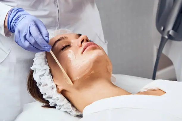 Photo of Face Skin Care. Close-up Of Woman Getting Facial Hydro Microdermabrasion Peeling Treatment At Cosmetic Beauty Spa Clinic. Hydra Vacuum Cleaner. Exfoliation, Rejuvenation And Hydratation. Cosmetology