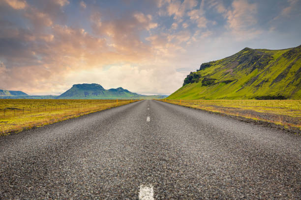 Open Iceland Ring Road or Route 1 under colorful twilight skyscape. The famous Iceland Ring Road is about 828 miles long - 1332 kilometres, making it the longest road in Iceland. Nordic Countries, Southern Iceland, Iceland, Europe