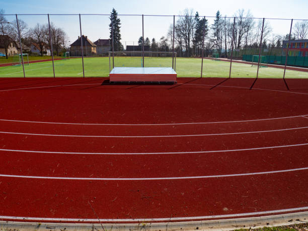 istock Curve of running tracks 1214336729