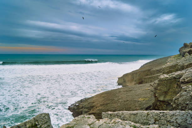 sea with clouds and rocks