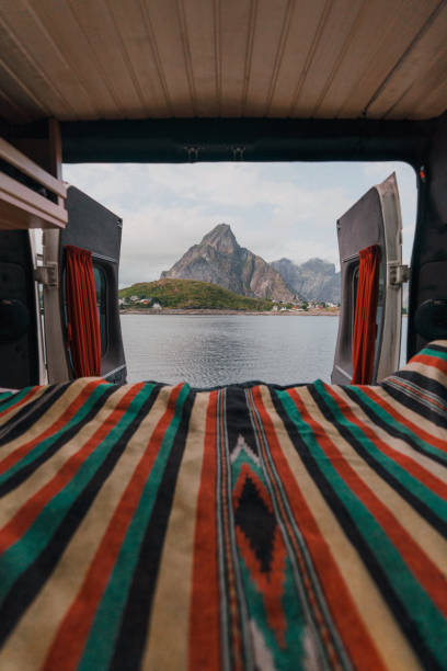 istock Camper van with view on seaside on Lofoten Island 1214338508