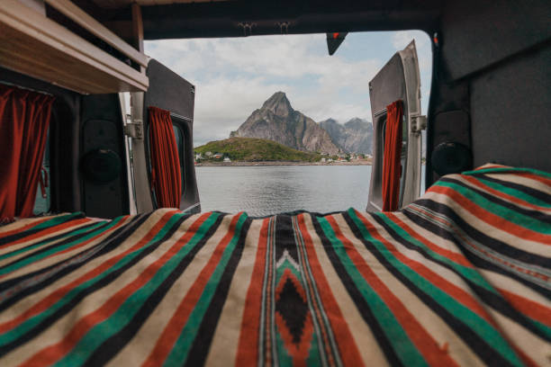 istock Camper van with view on seaside on Lofoten Island 1214338509