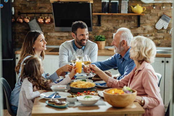 istock Family toast during lunch! 1214340926