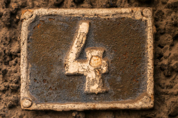 istock Old retro cast iron plate number 4 1214341085
