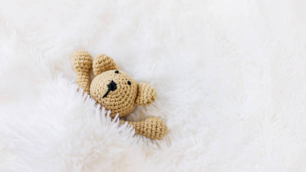 istock The little plush toy is sleeping. Selective focus. 1214342357