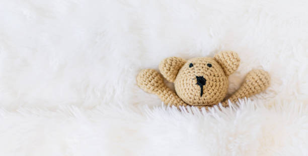 istock The little plush toy is sleeping. Selective focus. 1214342637