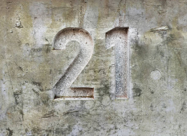 istock Volume Number 21 on a dirty, concrete wall 1214343194