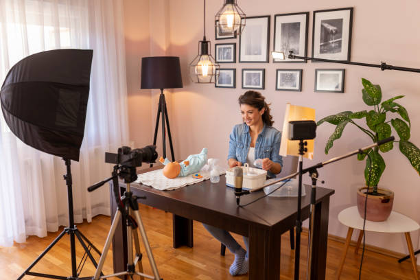 istock Nurse filming video about baby bottles sterilizing 1214343231