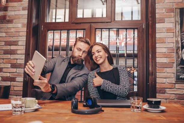 istock Business colleagues taking selfie with digital tablet 1214343939