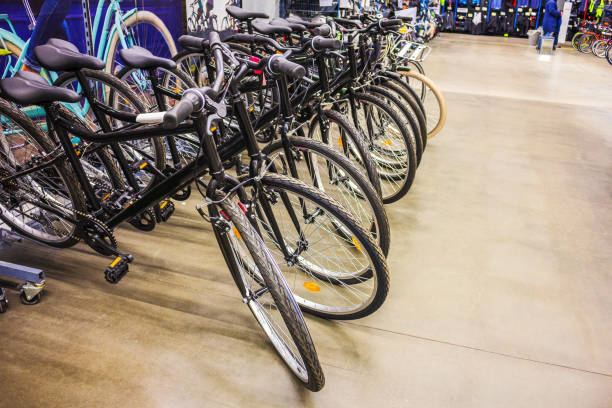 bicycle repair shop showroom eco transportation manufacture - mobile work imagens e fotografias de stock