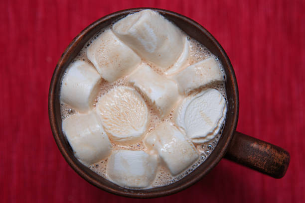 istock Marshmallows with cocoa in a brown clay cup 1214346401