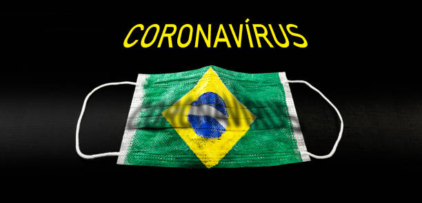 istock respiratory mask with the texture of flags from countries contaminated by coronavirus. Background image with pandemic concept, contagion by covid-19. Quarantine Brazil 1214347603