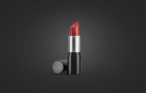 istock Blank black lipstick tube mockup, isolated on dark 1214348098