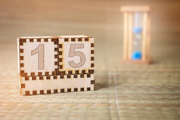 istock wooden cube with date 15 1214348443