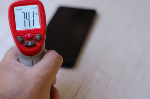 istock implements to identify the virus crown, thermometer and application, alcohol gel 1214348497