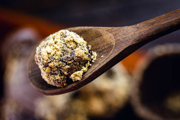 istock homemade chocolate bonbon with peanuts. Easter from brazil, gourmet chocolate egg. 1214350843