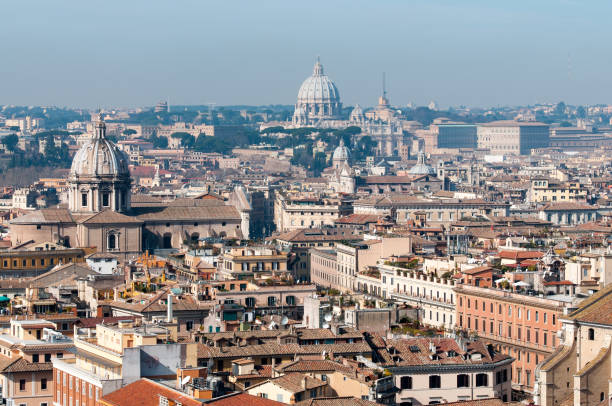 istock Rooftops of Rome with the St. Peter's Basilica 1214351227