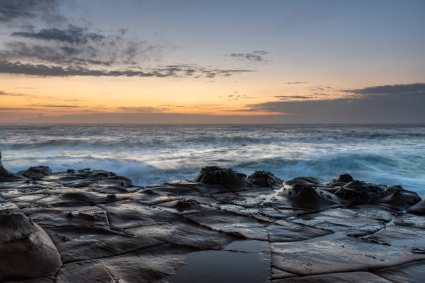 istock Coastal Sunrise Seascape from Rock Platform 1214353531