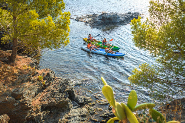 istock Spanish Kayakers Side by Side Along Mediterranean Shoreline 1214353605