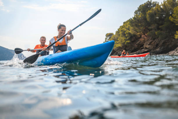 istock Dynamic View of Spanish Kayakers Paddling in Unison 1214353630