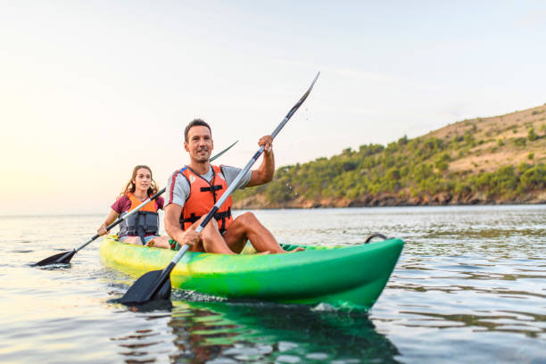 istock Spanish Kayakers Paddling in Unison off the Costa Brava 1214353641