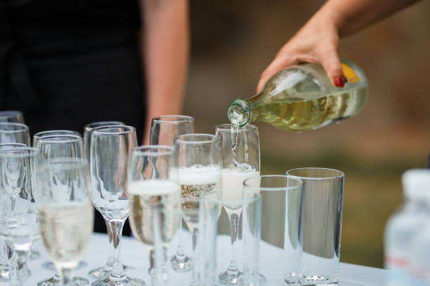 istock Glasses for wine and champagne on a served table at a banquet 1214355182