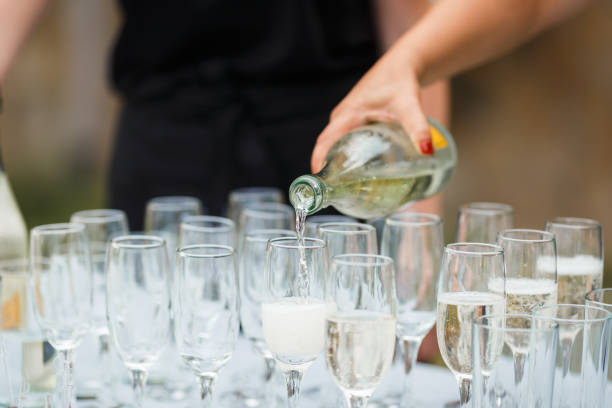istock Glasses for wine and champagne on a served table at a banquet 1214355514
