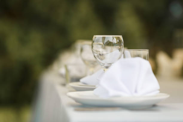 istock group of empty wine glasses on the table 1214355764