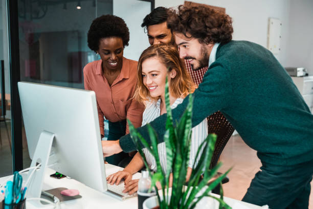 istock Creative business people working together in office 1214358341