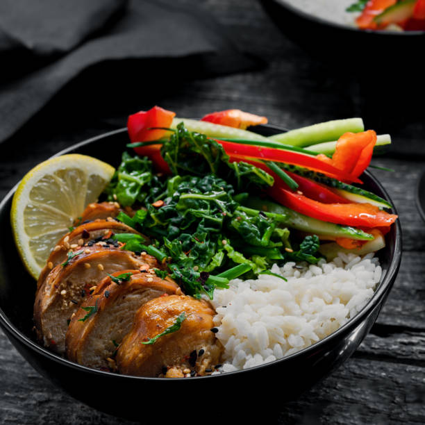 istock Teriyaki chicken with rice and salad 1214361259
