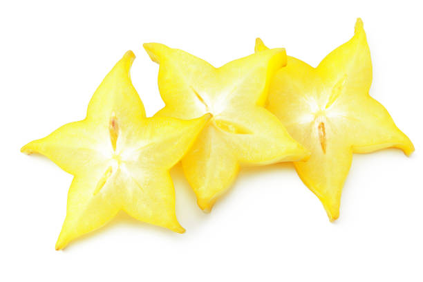 istock slice ripe star fruit carambola or star apple ( starfruit ) on white background. top view 1214361273