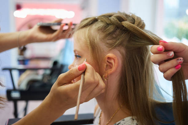 istock Children make up. Glitter makeup. Sparkles on cheek. 1214374026