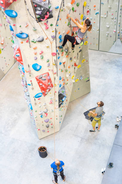 istock Group of People Indoor Rock Climbing 1214374897