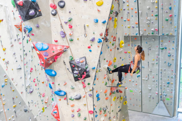 istock Young Woman Indoor Rock Climbing 1214374898