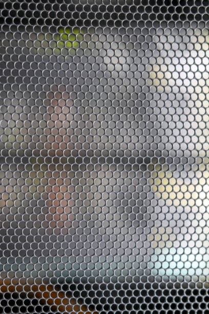 istock Grid background in the server room with wires from computers and network equipment 1214377588