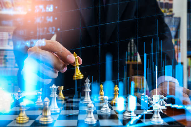 istock Chess game on chess board on stock market or forex trading graph chart for financial investment concept. Economy trends for digital business marketing strategy analysis. Abstract finance background. 1214378713