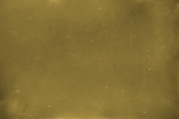 istock Gold color scratched high resolution background texture. 1214382188