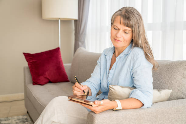 istock Woman with a tablet 1214382346
