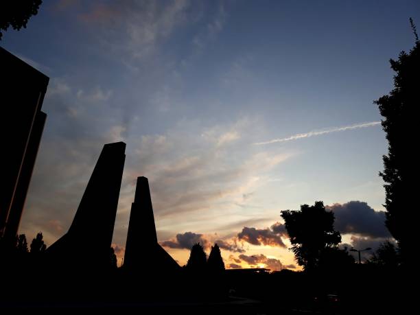 istock Corporate Buildings with statue silhouette 1214383139