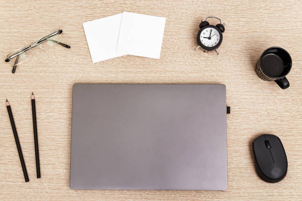 istock Work space and time management concept. Start of freelancers working day. Work from home under quarantine. Laptop and time monitoring, nine clock in morning. 1214383429