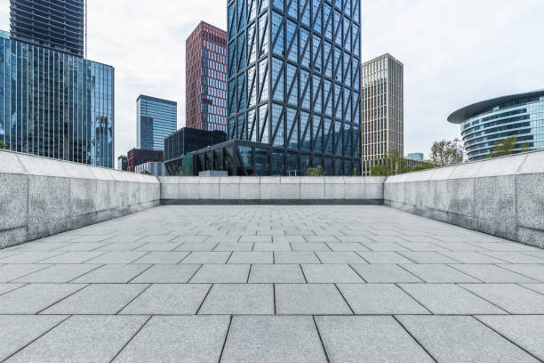 istock modern buildings and empty pavement in china 1214386085