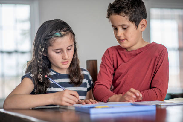 istock Kids are home schooled during isolation 1214386192