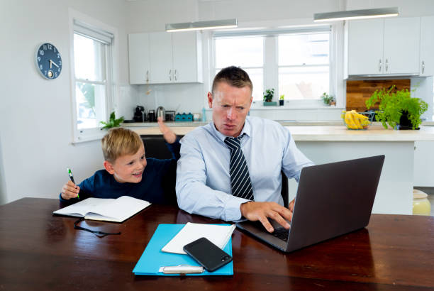 istock Coronavirus Outbreak schools and offices closing. Stressed parent trying to cope with remote work and homeschooling. COVID-19 pandemic forces shutdowns, quarantine, online learning and work from home. 1214388907