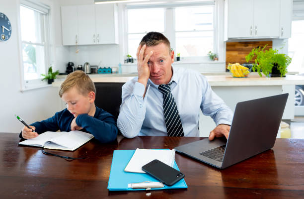 istock Coronavirus Outbreak schools and offices closing. Stressed parent trying to cope with remote work and homeschooling. COVID-19 pandemic forces shutdowns, quarantine, online learning and work from home. 1214388911